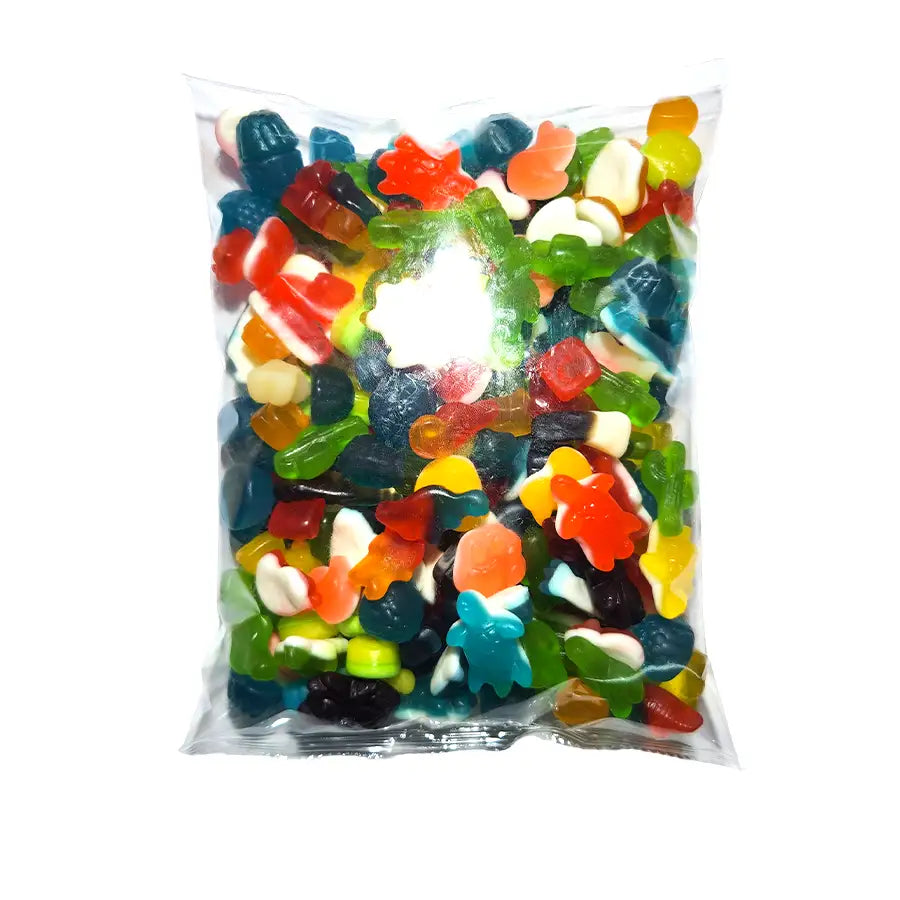 Bag of colorful gummy lollies on a white background