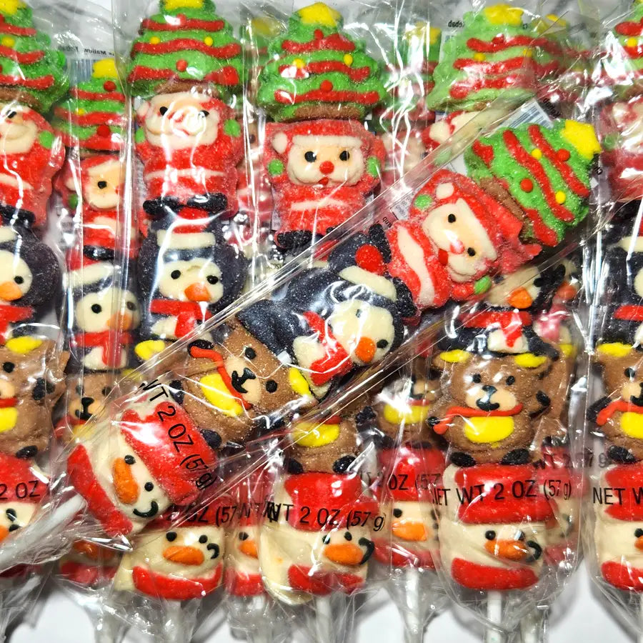 Assorted christmas-shaped marshmallows on a stick