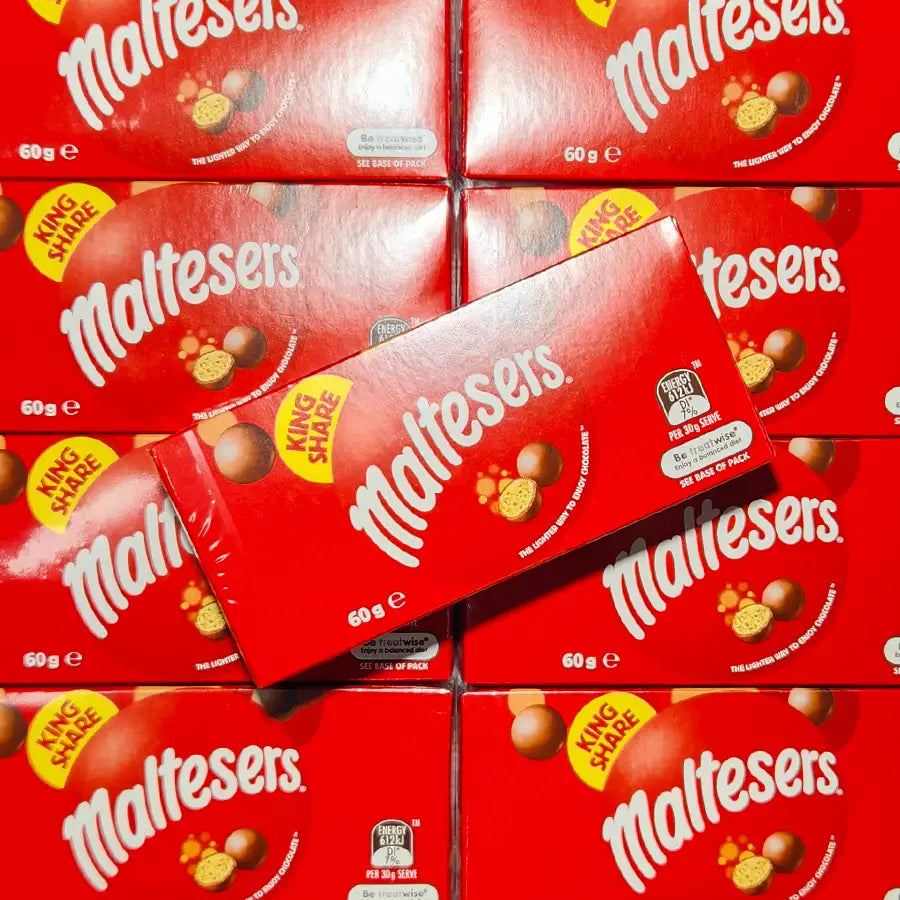 Stack of red Maltesers chocolate boxes with visible branding. 60 grams in size.
