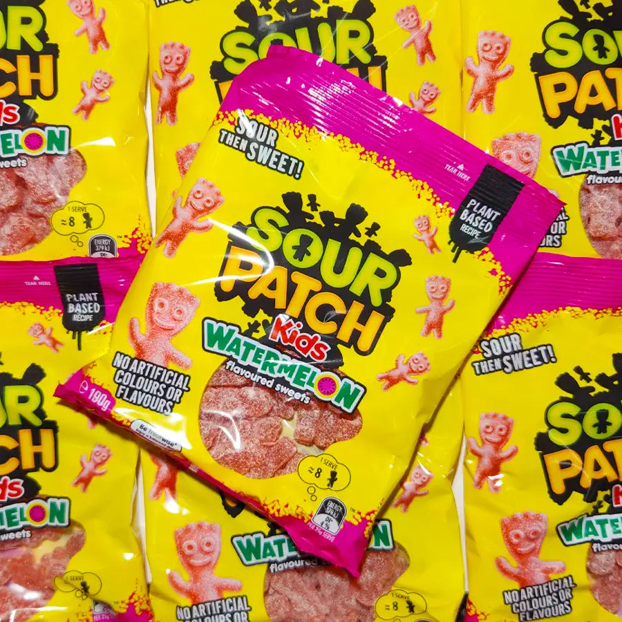 Sour Patch Kids Watermelon flavored candy packages with yellow and pink packaging.