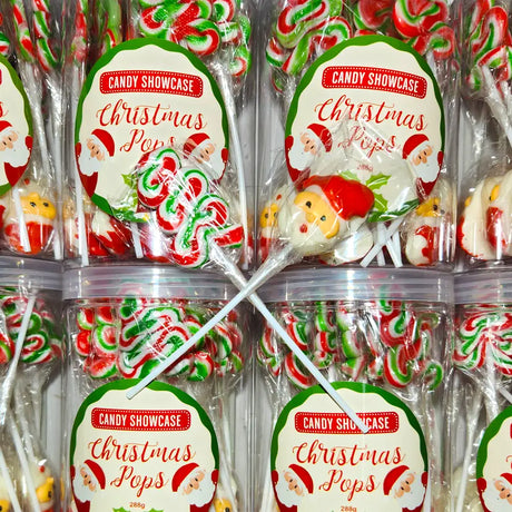 Candy Showcase Christmas Pops lollipops in clear packaging with Santa Claus design and a christmas tree design