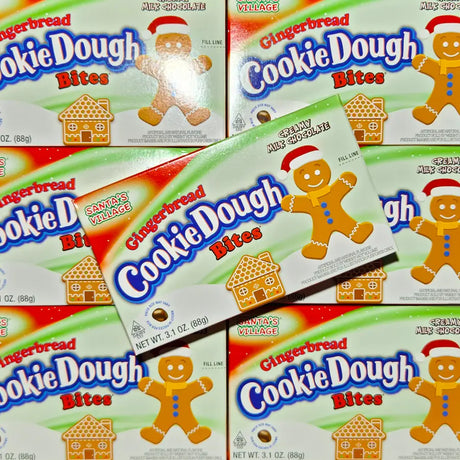 Multiple boxes of Gingerbread Cookie Dough Bites with a gingerbread man and house design on the packaging.
