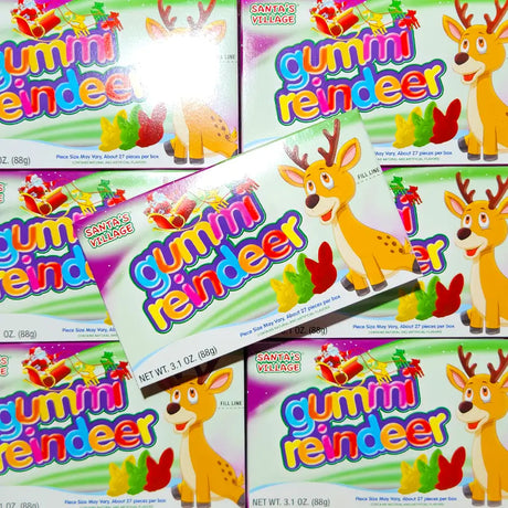 Multiple boxes of gummy reindeer candy with cartoon reindeer illustrations.