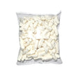 Clear plastic bag filled with white milk bottle shaped candies on a white background