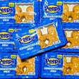 Multiple packages of Peeps Marshmallow Gingerbread Men in a blue packet with three pieces