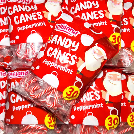 Red packets of Lolliland candy canes with Santa Claus illustrations on a red background.