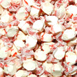 Close-up of white and red taffy pieces with visible text. Peppermint Flavour