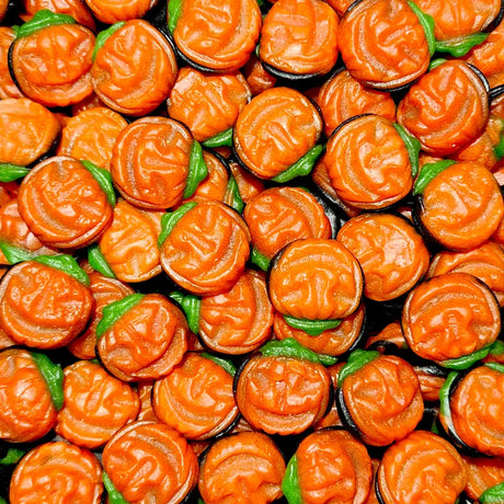 pumpkin shaped gummy lollies in orange green and black colour