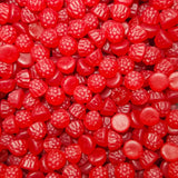 A close-up image of bite-sized red raspberry flavored candies.