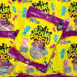 Multiple packages of Sour Patch Kids gummy candies with yellow and purple packaging.