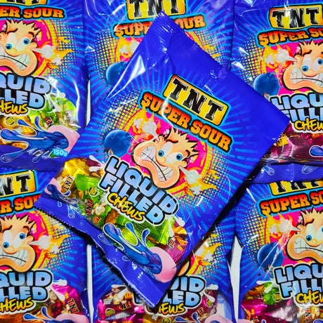 Multiple packages of TNT Super Sour Liquid Filled Chewy candies in a 150 gram sized bag