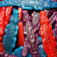 Crocodile Shaped Lollies in Purple, Blue and Red Colours